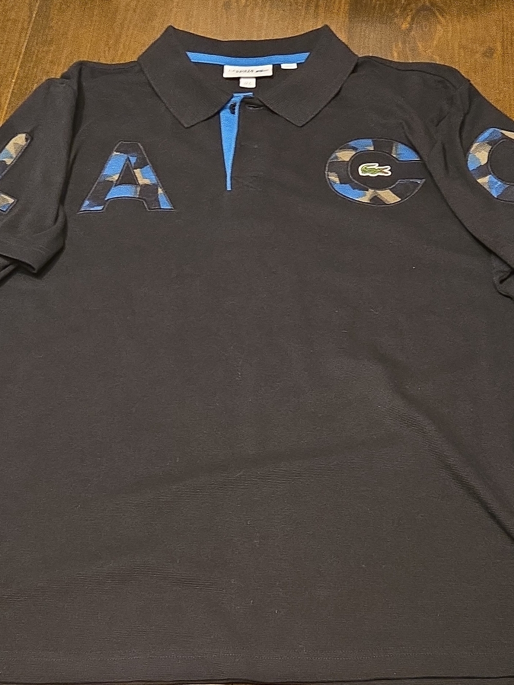 Lacoste Black Polo with Blue Trim and Camo Lettering